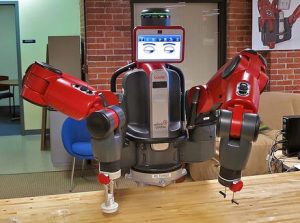 Rethink Robotics' Baxter, an innovative 2-arms cobot with 7 degrees of freedom per arm. The eyes in the computer screen move in the direction one of its arms is about to take. Photo credit: Steve Jurvetson