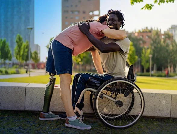 Two men hugging - inclusive cities - Dassault Systemes blog